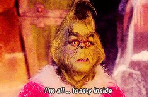 A Grinch From The Movie The Grinch Says I 'M All Toasty Inside GIF