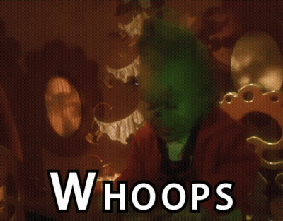 A Grinch Is Sitting In A Room With The Words Whoops Above Him GIF