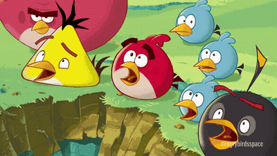 A Group Of Angry Birds Are Standing Next To Each Other In A Field GIF