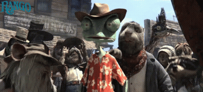 A Group Of Animals Are Standing In Front Of A Sign That Says Rango GIF
