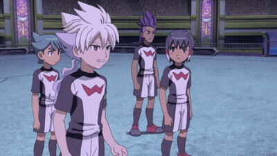 A Group Of Anime Characters Are Standing On A Field And One Of Them Has The Letter W On His Shirt GIF