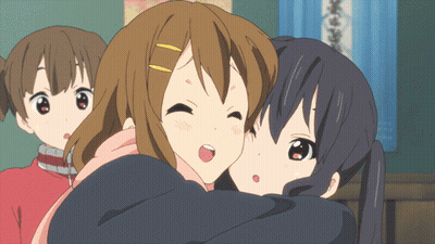 A Group Of Anime Girls Are Hugging Each Other And One Of Them Has A Surprised Look On Her Face GIF