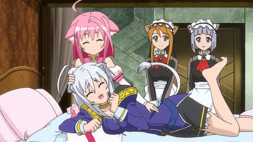 A Group Of Anime Girls Are Laying On A Bed And One Of Them Has A Cat Ear GIF
