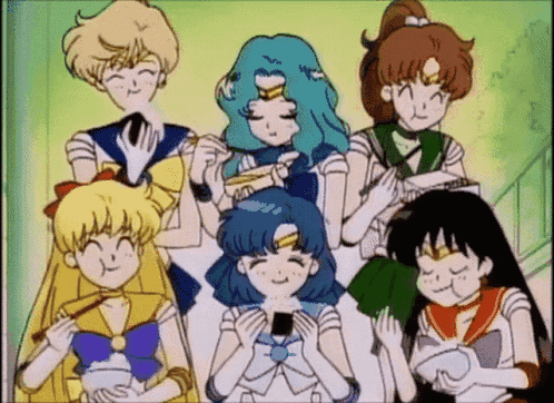 A Group Of Anime Girls Are Standing Next To Each Other And Eating Food . GIF