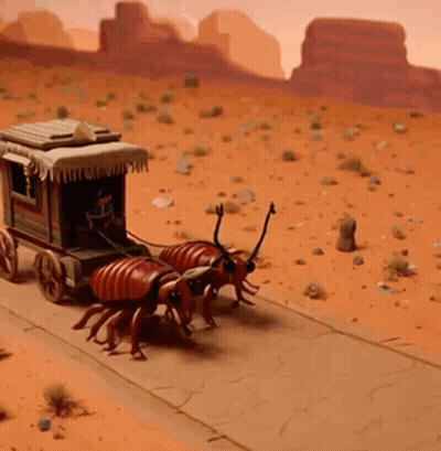 A Group Of Ants Are Pulling A Wagon In The Desert GIF