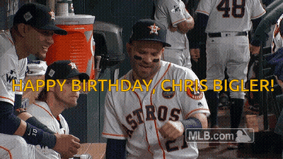 A Group Of Astros Baseball Players Are Celebrating Chris Bigler 'S Birthday In The Dugout GIF