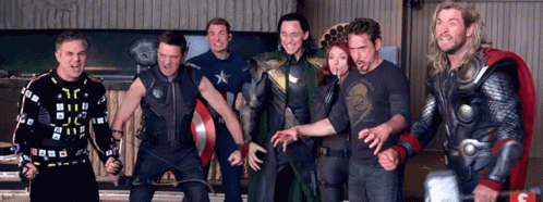 A Group Of Avengers Pose For A Photo Together GIF