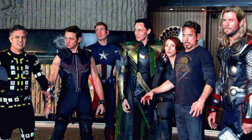A Group Of Avengers Posing For A Picture Including Captain America GIF