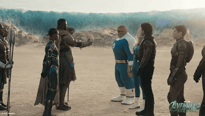 A Group Of Avengers Stand In A Desert GIF