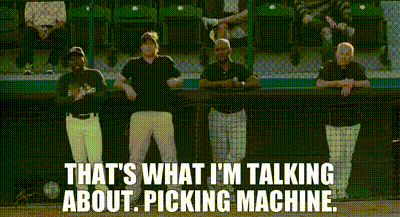 A Group Of Baseball Players Are Standing In A Dugout Talking About Picking Machine . GIF