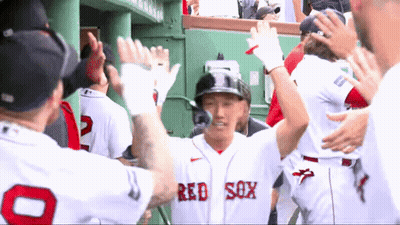 A Group Of Baseball Players Wearing Red Sox Uniforms GIF