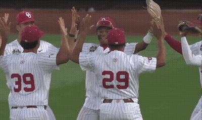 A Group Of Baseball Players With The Number 39 And 29 On Their Uniforms GIF