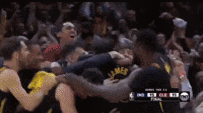 A Group Of Basketball Players Are Huddled Together And One Has The Word James On His Shirt GIF