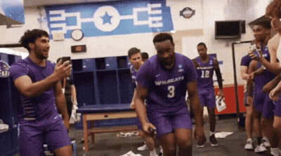A Group Of Basketball Players Are In A Locker Room And One Of Them Is Wearing A Number 3 Jersey GIF