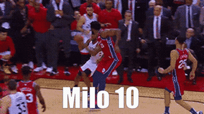A Group Of Basketball Players Are Playing A Game And One Of Them Has The Number 10 On His Jersey GIF