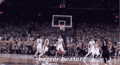 A Group Of Basketball Players Are Playing A Game Of Basketball And The Words Buzzer Beater Are On The Screen . GIF