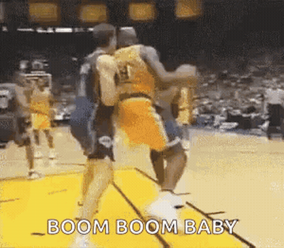 A Group Of Basketball Players Are Playing A Game Of Basketball . GIF