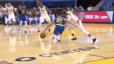A Group Of Basketball Players Are Playing A Game On A Court That Says Center On It . GIF