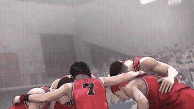 A Group Of Basketball Players Huddled Together With The Number 7 On The Back Of Their Jersey GIF