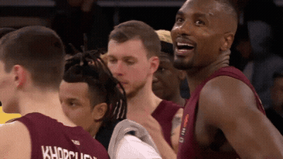 A Group Of Basketball Players One Of Whom Is Wearing A Shirt That Says Khadrau GIF