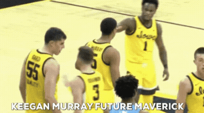 A Group Of Basketball Players Standing On A Court With The Words Keegan Murray Future Maverick Written On The Bottom GIF