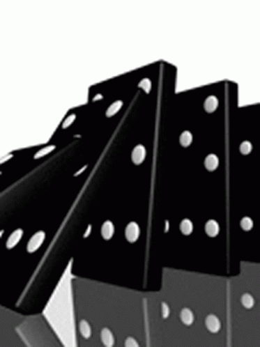 A Group Of Black Dominoes With White Dots On Them Are Stacked On Top Of Each Other On A Table . GIF