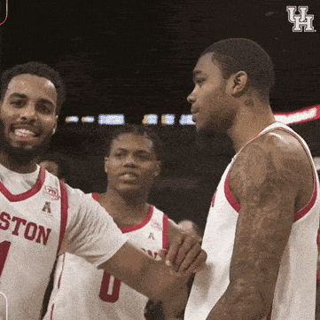 A Group Of Boston Basketball Players Shake Hands With Each Other GIF