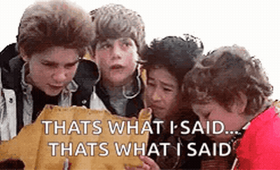 A Group Of Boys Are Looking At A Piece Of Paper That Says That 'S What I Said GIF