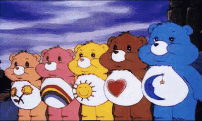 A Group Of Care Bears Standing Next To Each Other In A Row . GIF