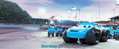 A Group Of Cars Are On A Race Track And One Of Them Says " Real Funny " GIF