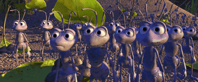 A Group Of Cartoon Ants Are Standing In A Line GIF