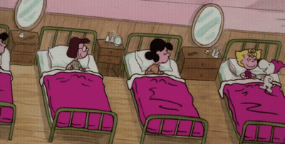 A Group Of Cartoon Characters Are Laying In Beds With Pink Blankets GIF