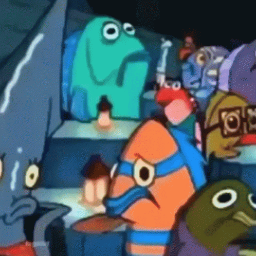 A Group Of Cartoon Characters Are Sitting Around A Table In A Dark Room . GIF
