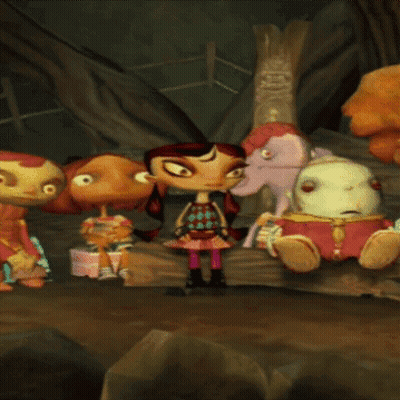 A Group Of Cartoon Characters Are Sitting On A Rock GIF