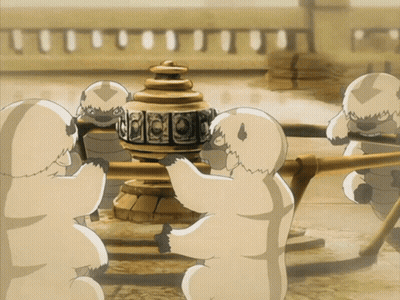 A Group Of Cartoon Characters Are Standing Around A Statue That Says ' Aang ' On The Top GIF