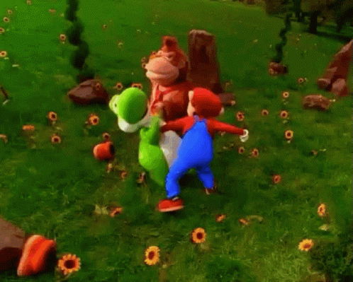 A Group Of Cartoon Characters Are Standing In A Field . GIF