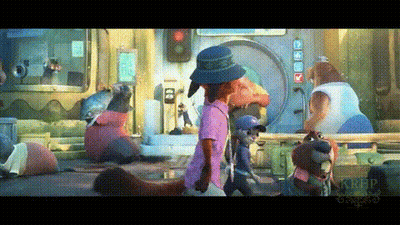 A Group Of Cartoon Characters Are Walking Down A Street In Front Of A Building . GIF