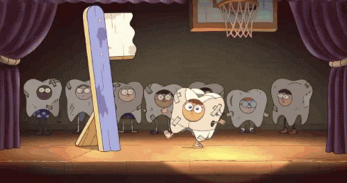 A Group Of Cartoon Characters Dressed As Teeth Are Standing On A Stage In Front Of A Basketball Hoop GIF