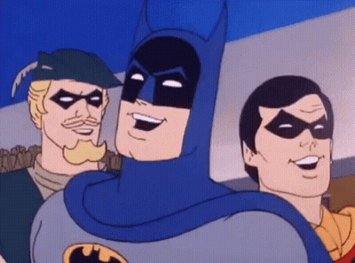 A Group Of Cartoon Characters Including Batman And Robin Smiling GIF