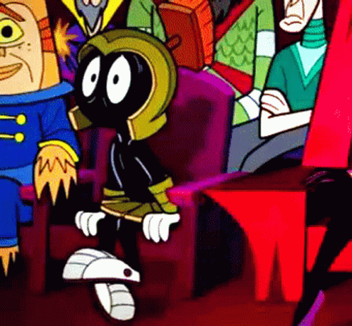 A Group Of Cartoon Characters Including Marvin The Martian Are Sitting In Chairs GIF