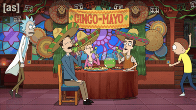 A Group Of Cartoon Characters Sitting At A Table With A Sign That Says Cinco-Mayo On It GIF