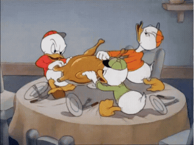A Group Of Cartoon Ducks Are Eating A Turkey GIF