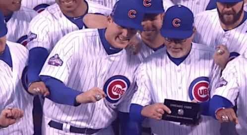 A Group Of Chicago Cubs Baseball Players Are Posing For A Photo GIF