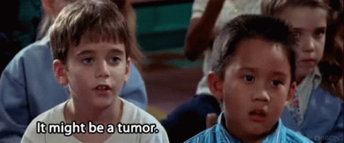 A Group Of Children Are Sitting In A Classroom And One Of Them Is Saying It Might Be A Tumor GIF