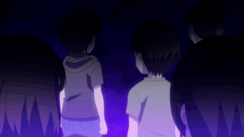 A Group Of Children Are Standing In The Dark With Their Eyes Lit Up GIF