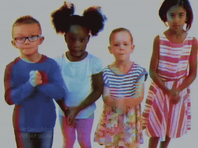 A Group Of Children Are Standing Next To Each Other With The Words Mr. Smurf Written On The Bottom Left GIF