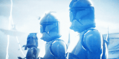 A Group Of Clone Troopers Are Standing Next To Each Other In A Blue Light GIF
