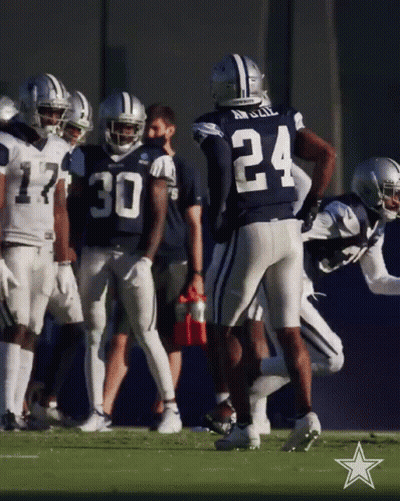 A Group Of Cowboys Football Players Including Number 24 GIF