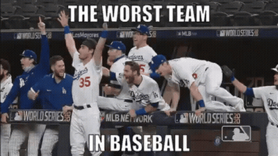 A Group Of Dodgers Baseball Players Celebrate In The Dugout GIF