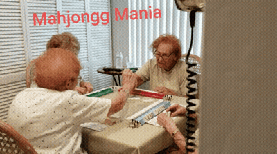 A Group Of Elderly Women Playing Mahjongg With The Words Mahjongg Mania Above Them GIF